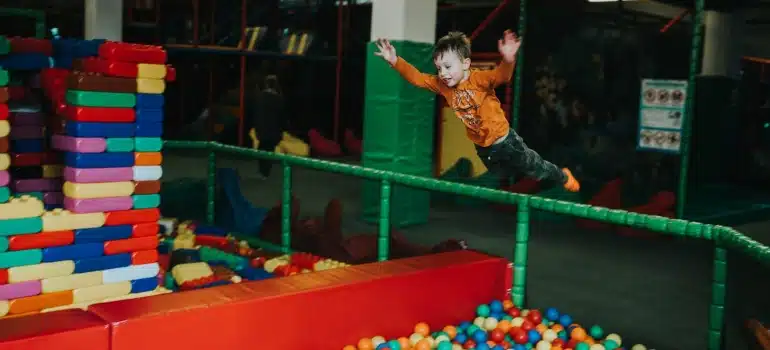 a kid in a playroom 