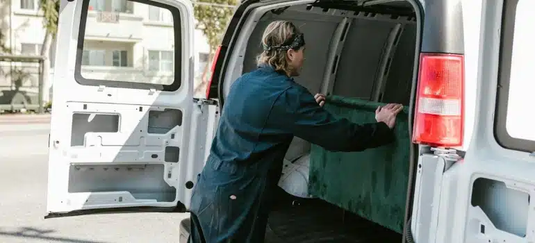 a mover loading a moving truck