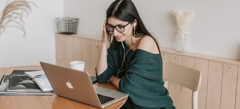 a woman using a laptop