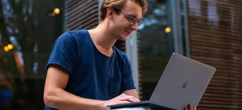 a man browsing to find a roommate in Miami