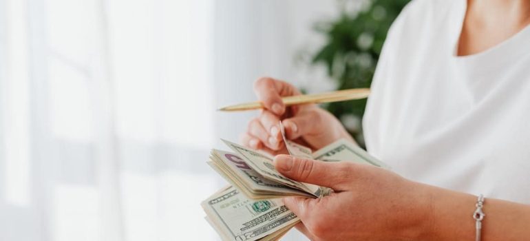 a woman counting money