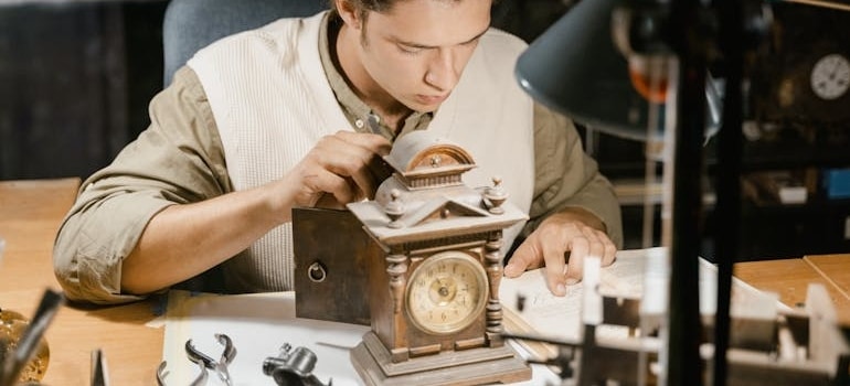 A Watchmaker Repairing an Antique Clock