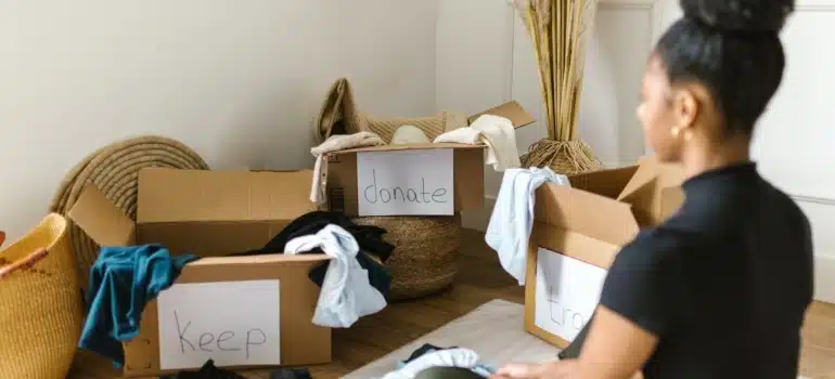 boxes labeled sell and donate