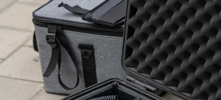 A gray padded case needed to safely pack home audio equipment
