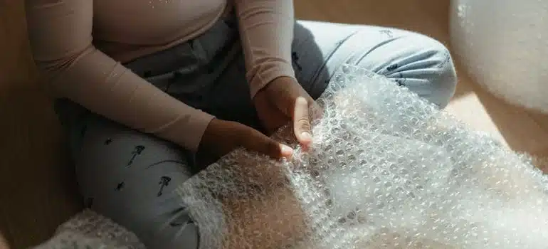 A child popping bubble wrap