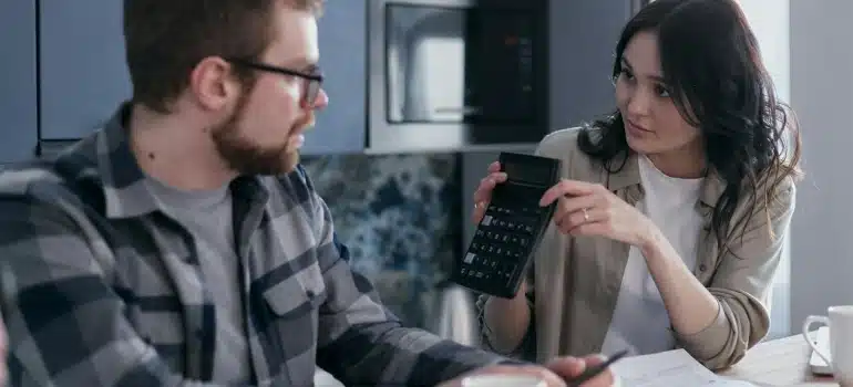 a couple calculating North Miami VS South Miami cost of living