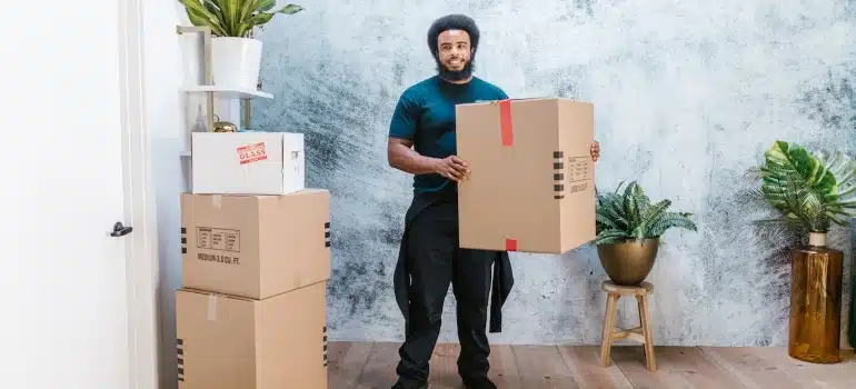 a mover carrying a box