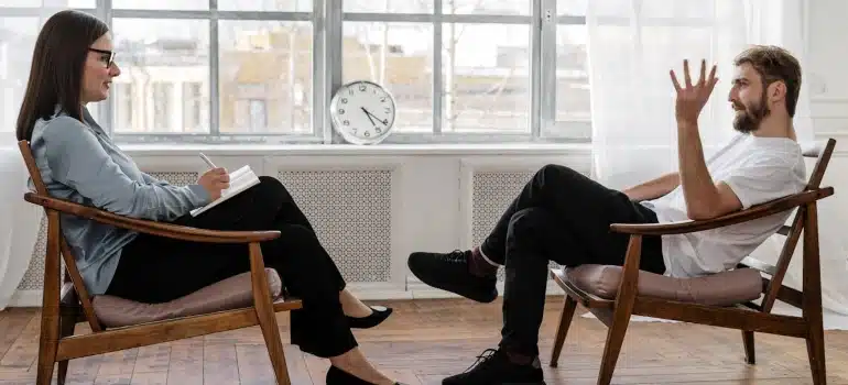 a person talking to a psychologist to recharge after an interstate move