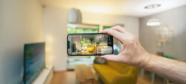 a person taking a photo of a living room