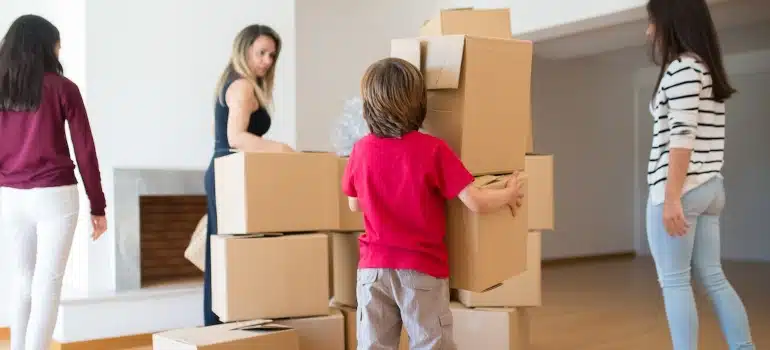 a family packing before they sell your luxury property in Miami before leaving Florida 