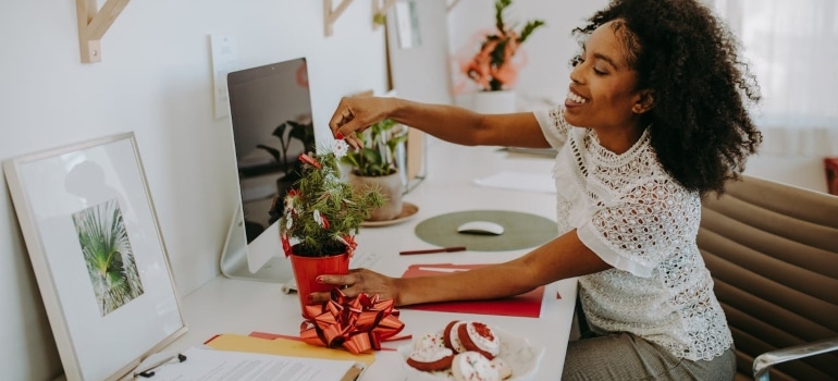 a woman Decorating your Miami office after relocation