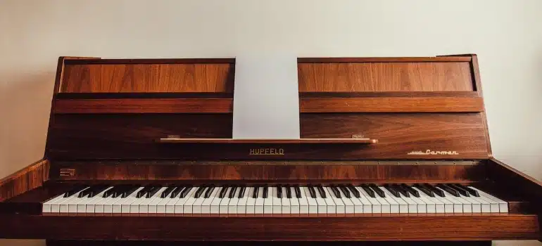 a piano = ine of the things you may regret decluttering when movign