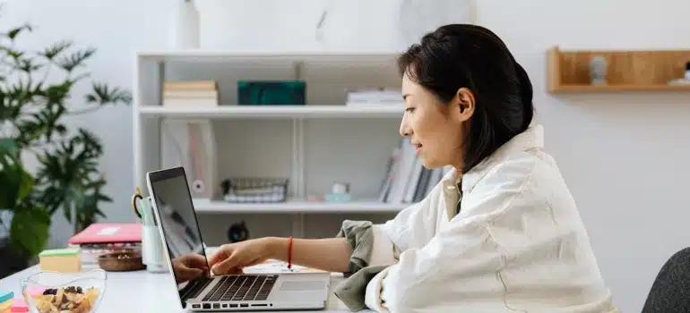 a woman working after turning a garage into an office