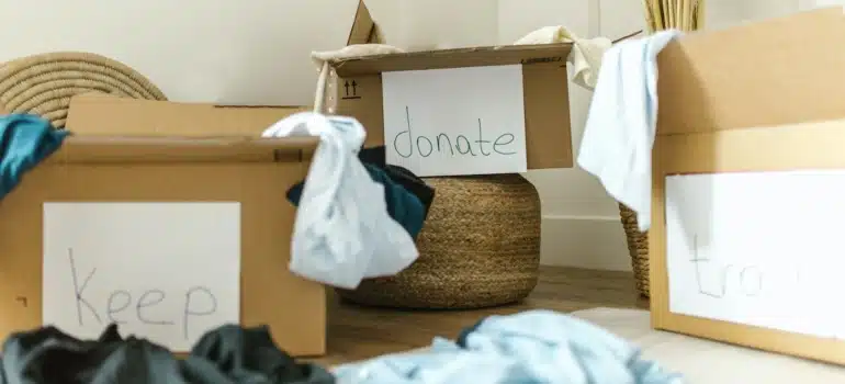 boxes labeled sell and donate