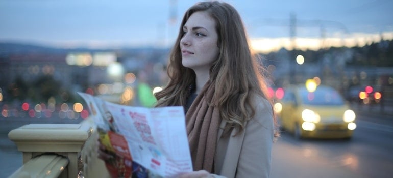 a woman looking at a map