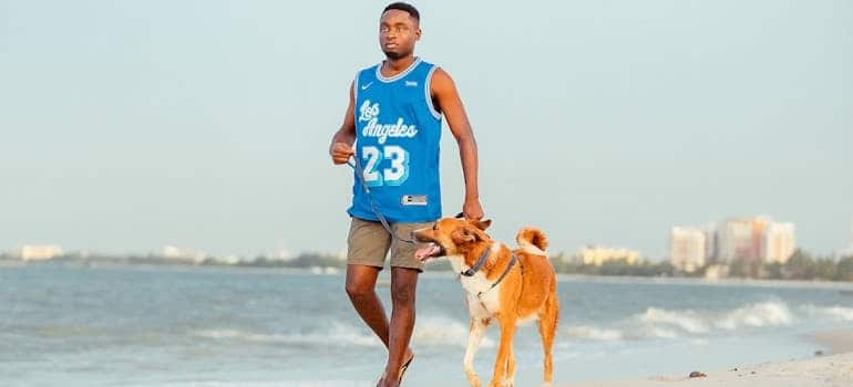 a man walking a dog
