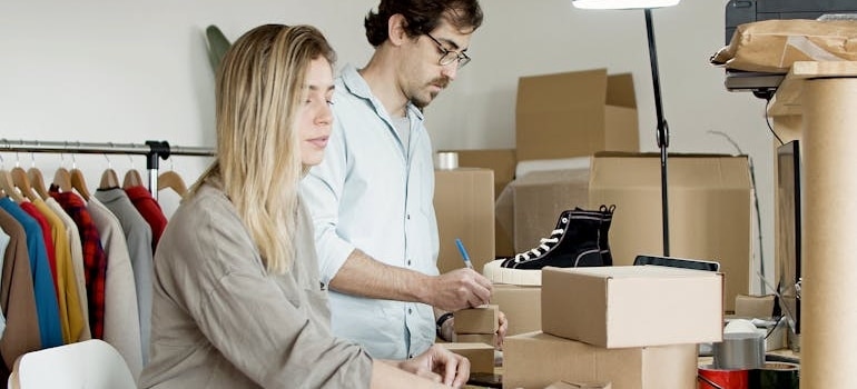 two people packing