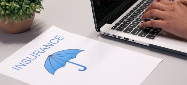insurance and umbrella on the paper