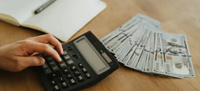 a person budgeting to avoid issues when moving antique furniture internationally