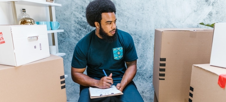 a man using an inventory list 