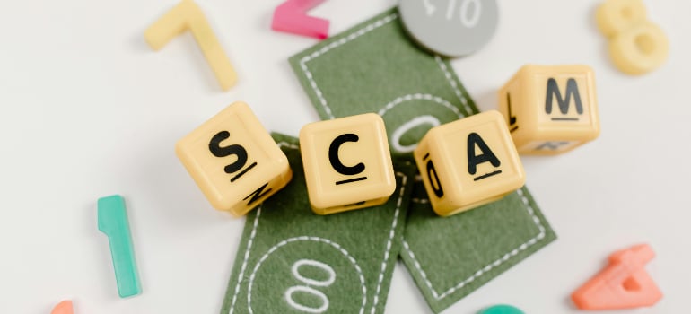 SCAM letter blocks on faux money and numbers, caution tips for first-time homebuyers in Bal Harbour to avoid fraud.