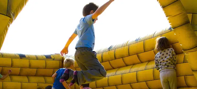 Kids jumping on a trampoline