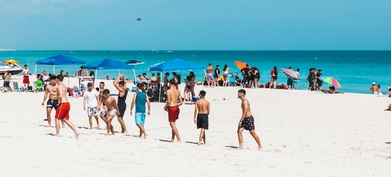 People on a beach on a sunny day