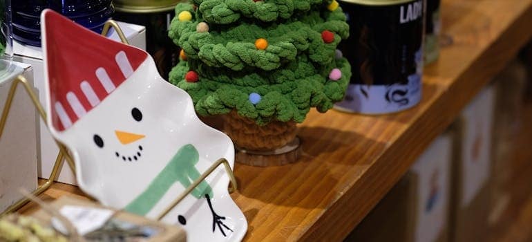 Festive Christmas display with gifts and decor in a South Florida Christmas market