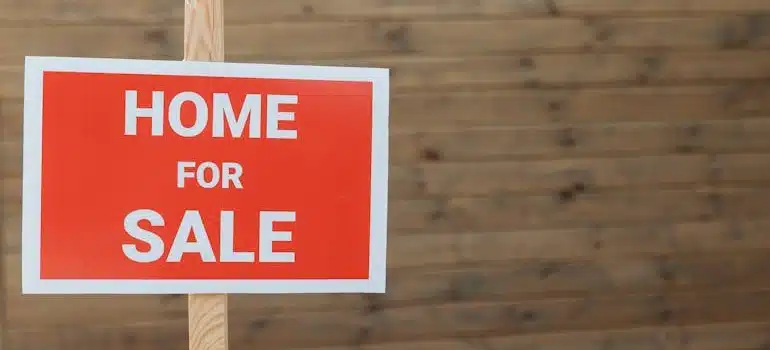 A sign labeled home for sale