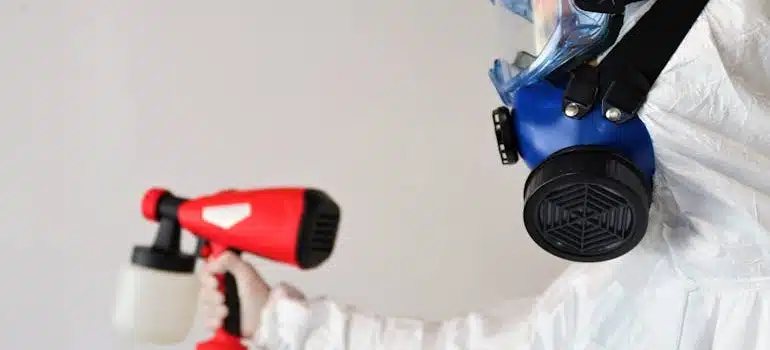 person in hazmat suit handling mold in your home in Davie